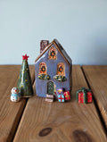 Blue Christmas Cottage with Tree Candle House